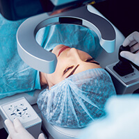 Woman laying down for cataract surgery